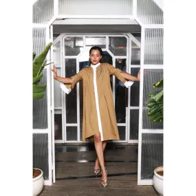 Khaki shirt dress features white mandarin collar, white cuffs and chain feature on the shoulder.